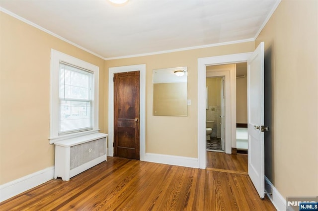 39 Lexington Ave, Bloomfield, NJ 07003 - unfurnished bedroom with radiator, wood finished floors, and ornamental molding