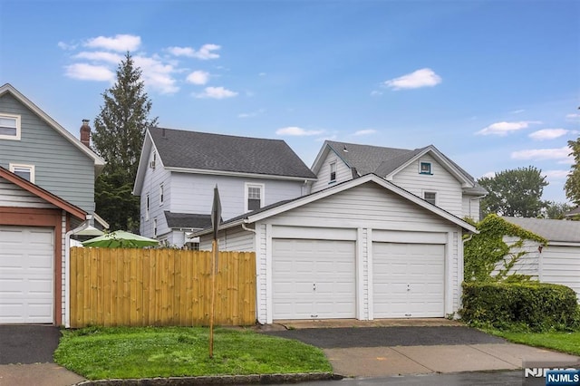 39 Lexington Ave, Bloomfield, NJ 07003 - garage featuring asphalt driveway