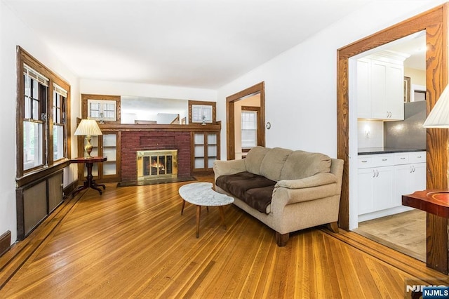 39 Lexington Ave, Bloomfield, NJ 07003 - living area featuring light wood-style floors and a fireplace