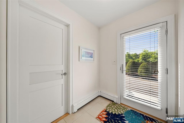 811 Domm Ct, Wyckoff, NJ 07481 - entryway with light tile patterned floors and baseboard heating