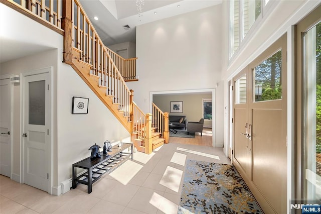 811 Domm Ct, Wyckoff, NJ 07481 - foyer featuring a high ceiling, light tile patterned floors, stairs, and recessed lighting