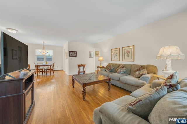 79 Roseland Ave Unit 74, Caldwell, NJ 07006 - living area with a chandelier and light wood finished floors