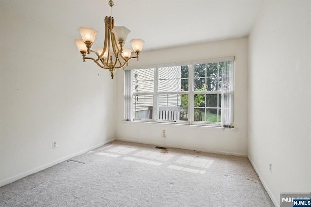 71 Butternut Dr Unit 71, Wayne, NJ 07470 - spare room with a chandelier and carpet