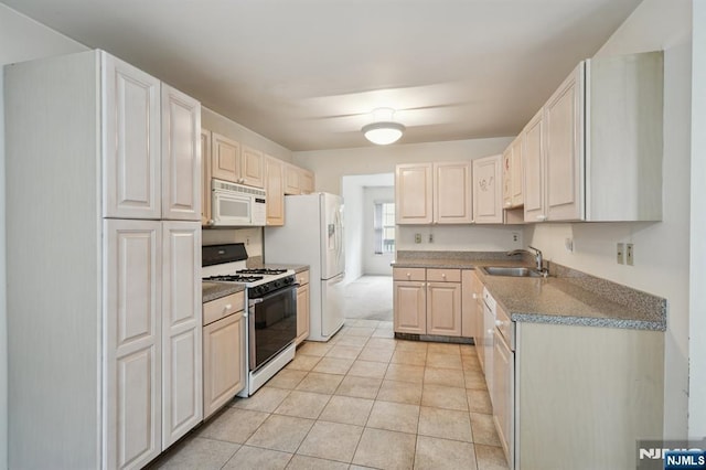 71 Butternut Dr Unit 71, Wayne, NJ 07470 - kitchen featuring white appliances and light tile patterned floors