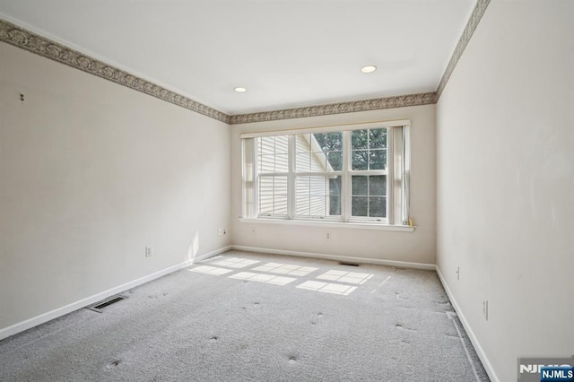 71 Butternut Dr Unit 71, Wayne, NJ 07470 - unfurnished room with light colored carpet, crown molding, and recessed lighting