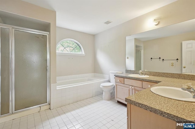 71 Butternut Dr Unit 71, Wayne, NJ 07470 - bathroom featuring double vanity, a stall shower, tile patterned floors, and a bath