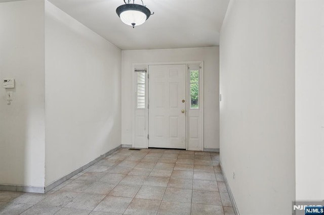 71 Butternut Dr Unit 71, Wayne, NJ 07470 - foyer entrance featuring baseboards