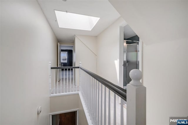 23 Bromley Pl, Bloomfield, NJ 07003 - hallway with a skylight and an upstairs landing