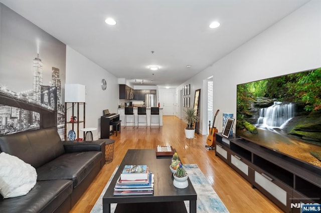 5711 Jefferson St Unit 405, West New York, NJ 07093 - living area with light wood finished floors and recessed lighting
