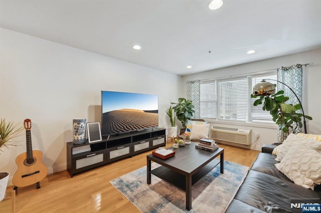 5711 Jefferson St Unit 405, West New York, NJ 07093 - living room with light wood finished floors, recessed lighting, and a wall unit AC