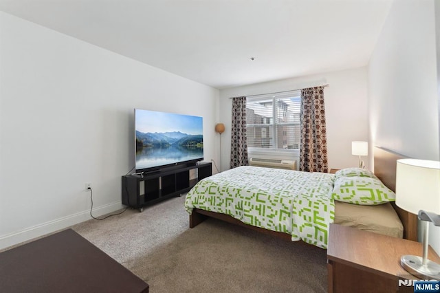 5711 Jefferson St Unit 405, West New York, NJ 07093 - carpeted bedroom featuring baseboards and a wall mounted AC