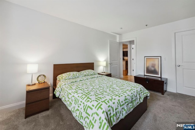 5711 Jefferson St Unit 405, West New York, NJ 07093 - carpeted bedroom with baseboards