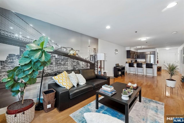 5711 Jefferson St Unit 405, West New York, NJ 07093 - living room featuring light wood-style flooring and recessed lighting