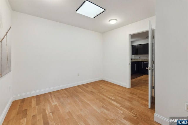 5711 Jefferson St Unit 405, West New York, NJ 07093 - unfurnished room with light wood-style flooring and baseboards
