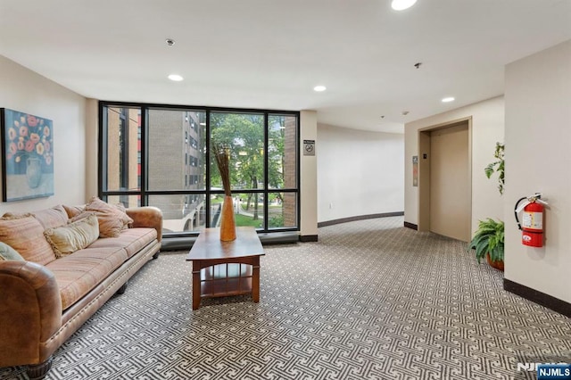 5711 Jefferson St Unit 405, West New York, NJ 07093 - carpeted living area with elevator, recessed lighting, and floor to ceiling windows