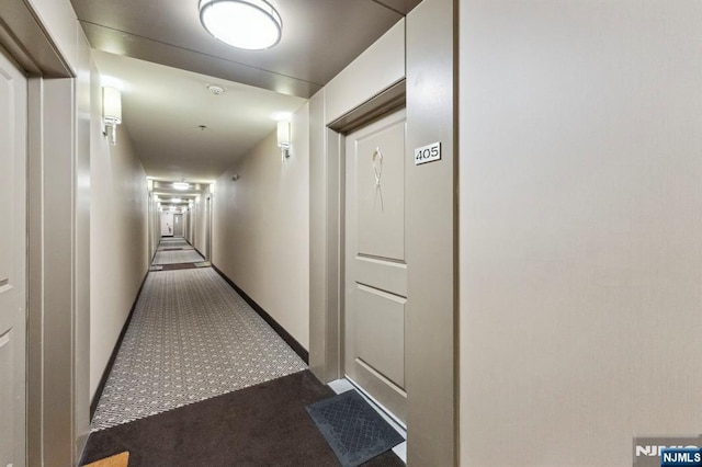 5711 Jefferson St Unit 405, West New York, NJ 07093 - hall featuring carpet and baseboards