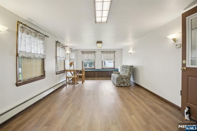 28 Stylon Rd, Wayne, NJ 07470 - sitting room featuring a baseboard radiator and wood finished floors