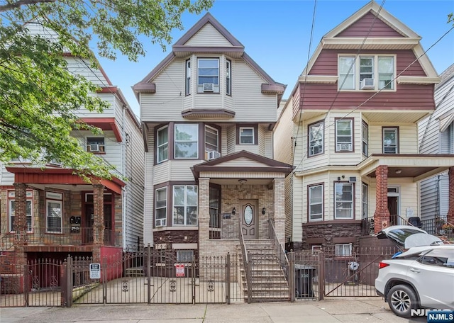 320 Clifton Ave, Newark, NJ 07104 - view of front of house featuring a gate and a fenced front yard