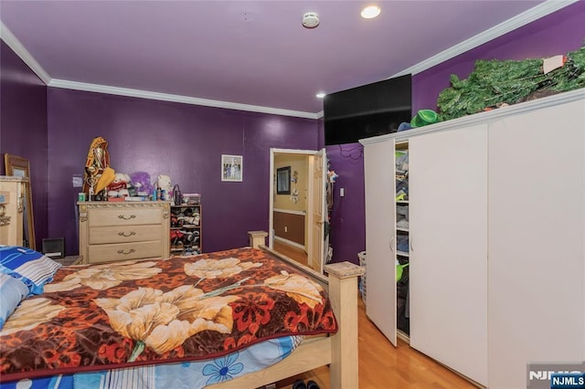 320 Clifton Ave, Newark, NJ 07104 - bedroom featuring crown molding, wood finished floors, and recessed lighting