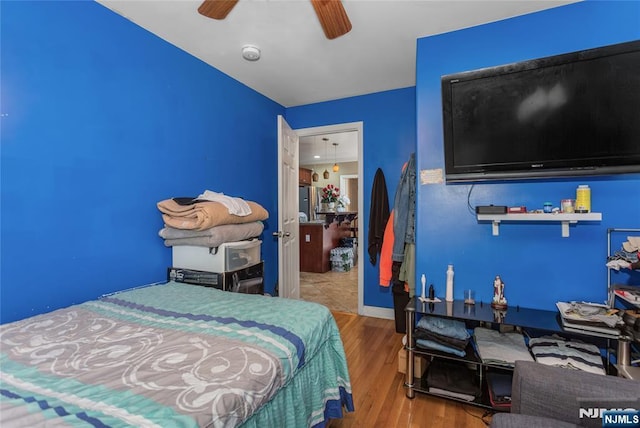 320 Clifton Ave, Newark, NJ 07104 - bedroom with wood finished floors and a ceiling fan