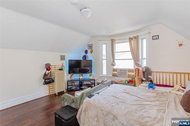 320 Clifton Ave, Newark, NJ 07104 - bedroom featuring radiator heating unit, vaulted ceiling, wood finished floors, and cooling unit