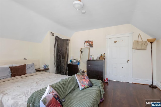 320 Clifton Ave, Newark, NJ 07104 - bedroom with lofted ceiling and wood finished floors