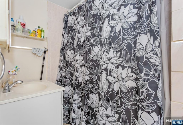 320 Clifton Ave, Newark, NJ 07104 - bathroom with vanity and a shower with curtain