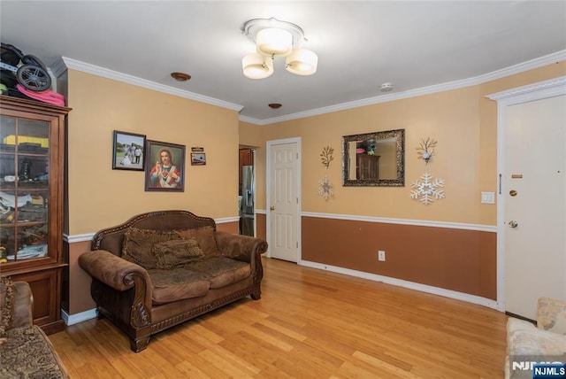 320 Clifton Ave, Newark, NJ 07104 - living area with ornamental molding and light wood-style floors