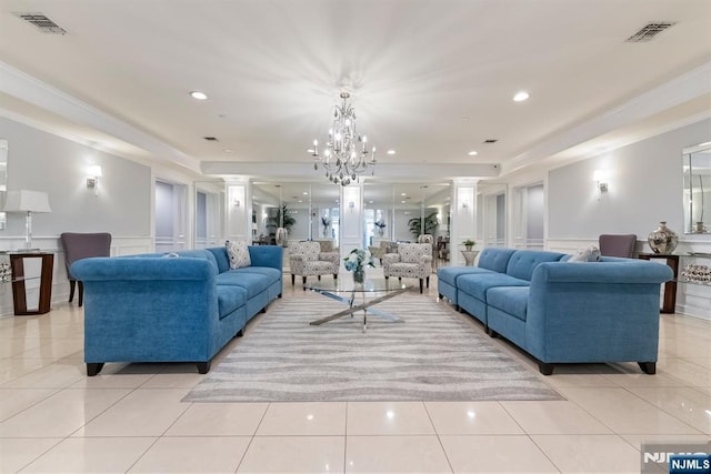7303 Ravenscroft Rd Unit 570, Clifton, NJ 07013 - living room with a decorative wall, crown molding, wainscoting, light tile patterned floors, and a chandelier