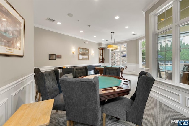 7303 Ravenscroft Rd Unit 570, Clifton, NJ 07013 - dining area with a decorative wall, wainscoting, pool table, crown molding, and carpet floors