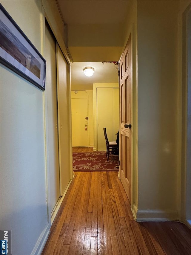 3081 Edwin Unit 2E, Fort Lee, NJ 07024 - hallway with hardwood / wood-style flooring