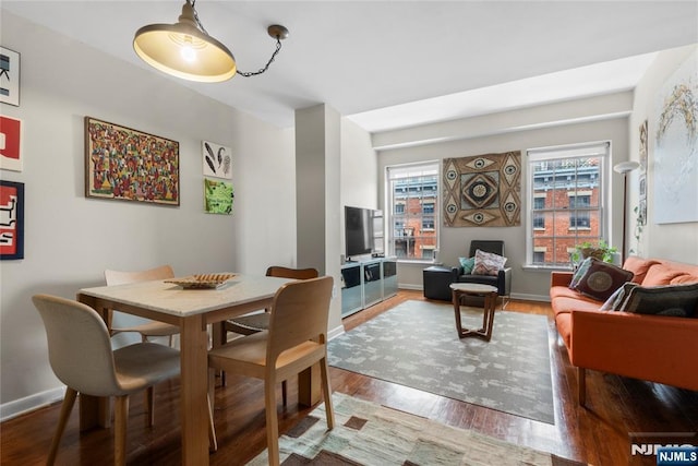 187 Wayne St Unit 405, Jersey City, NJ 07302 - dining space featuring wood finished floors and baseboards