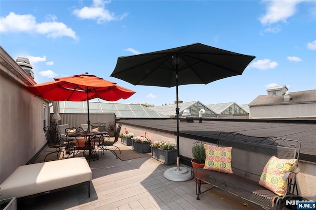 187 Wayne St Unit 405, Jersey City, NJ 07302 - wooden deck with outdoor dining space