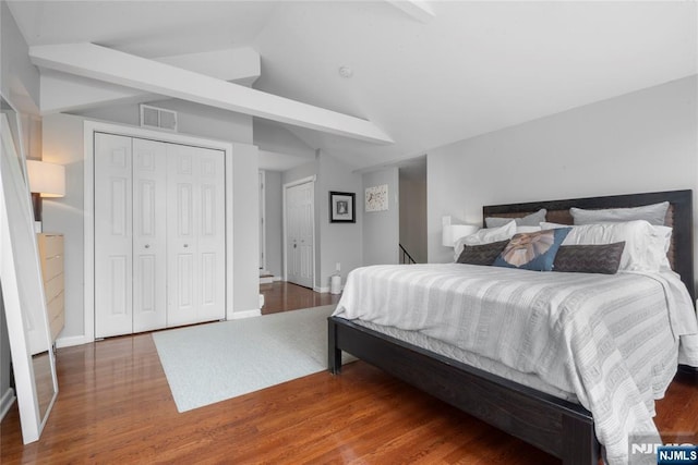 187 Wayne St Unit 405, Jersey City, NJ 07302 - bedroom featuring wood finished floors and vaulted ceiling