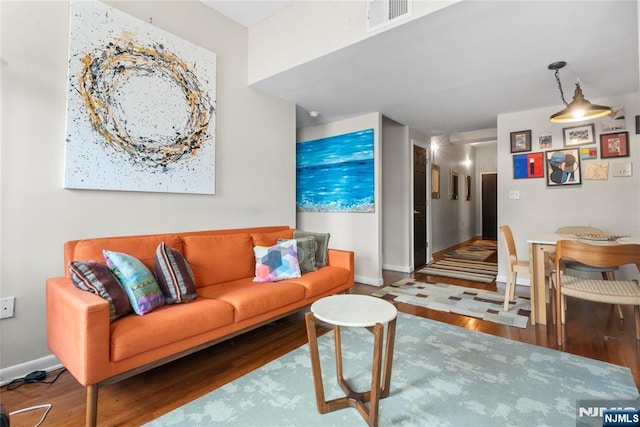 187 Wayne St Unit 405, Jersey City, NJ 07302 - living area with wood finished floors and baseboards