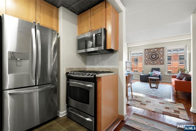 187 Wayne St Unit 405, Jersey City, NJ 07302 - kitchen featuring appliances with stainless steel finishes, light countertops, and open floor plan