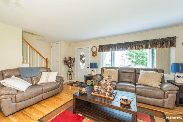 20 Goss Pl, Clifton, NJ 07013 - living area featuring stairs and wood finished floors