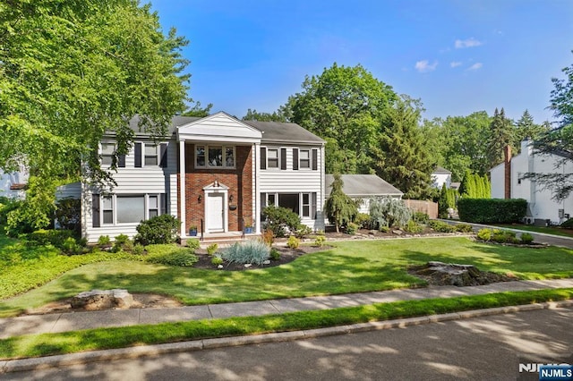 506 Salem St, Paramus, NJ 07652 - neoclassical / greek revival house featuring a front lawn and brick siding