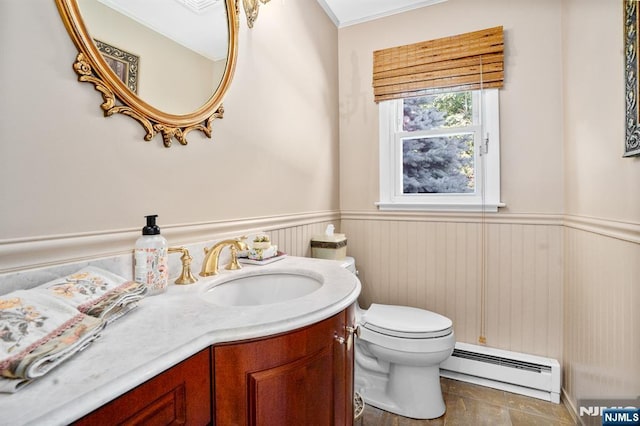 506 Salem St, Paramus, NJ 07652 - bathroom with a baseboard radiator, vanity, and wainscoting