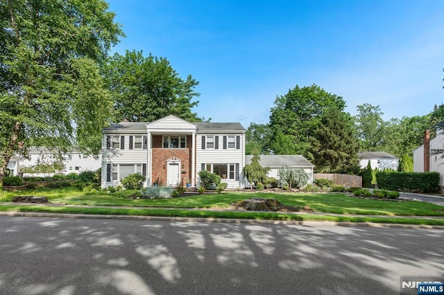 506 Salem St, Paramus, NJ 07652 - neoclassical / greek revival house featuring a front lawn and brick siding