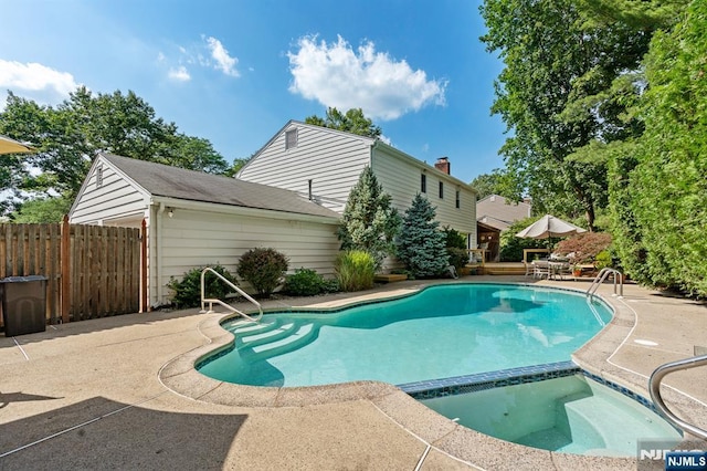 506 Salem St, Paramus, NJ 07652 - view of swimming pool with a patio area and a pool with connected hot tub