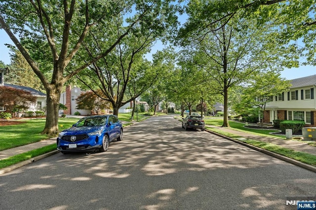 506 Salem St, Paramus, NJ 07652 - view of asphalt road featuring sidewalks and curbs