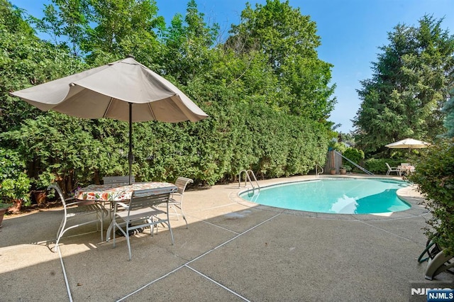 506 Salem St, Paramus, NJ 07652 - outdoor pool featuring a patio and outdoor dining space