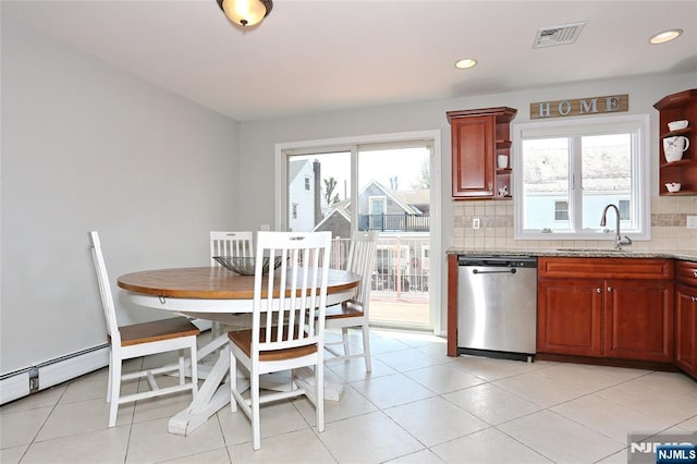 400 Lawton Ave Unit C0400, Cliffside Park, NJ 07010 - kitchen with stainless steel dishwasher, open shelves, plenty of natural light, backsplash, and recessed lighting