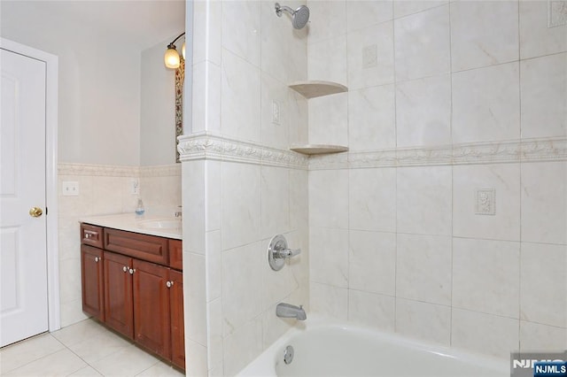 400 Lawton Ave Unit C0400, Cliffside Park, NJ 07010 - bathroom featuring vanity, shower / bathtub combination, tile walls, and tile patterned floors