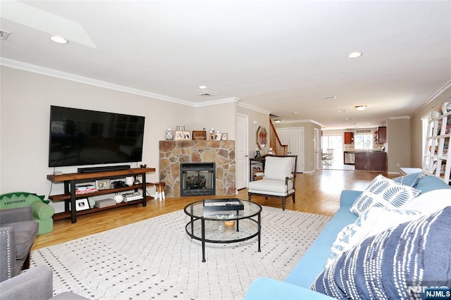 400 Lawton Ave Unit C0400, Cliffside Park, NJ 07010 - living room featuring crown molding, light wood finished floors, recessed lighting, and a stone fireplace