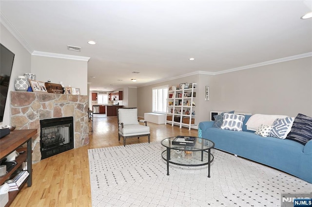 400 Lawton Ave Unit C0400, Cliffside Park, NJ 07010 - living area featuring wood finished floors, ornamental molding, a stone fireplace, and recessed lighting