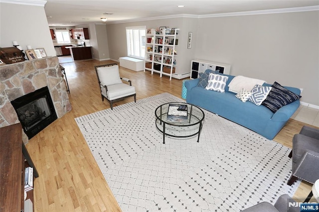 400 Lawton Ave Unit C0400, Cliffside Park, NJ 07010 - living room featuring wood finished floors, ornamental molding, a fireplace, and recessed lighting