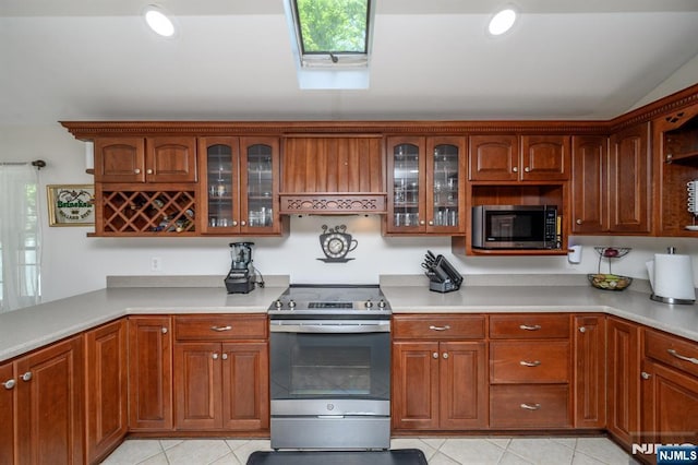 20 Card St, Hamburg, NJ 07419 - kitchen featuring appliances with stainless steel finishes, light tile patterned flooring, and light countertops