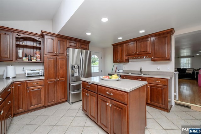20 Card St, Hamburg, NJ 07419 - kitchen featuring stainless steel fridge, light countertops, light tile patterned flooring, recessed lighting, and a kitchen island